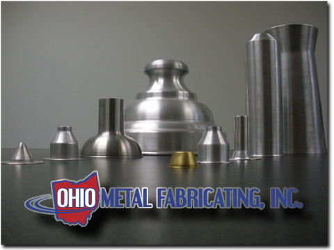 An assortment of hand spun parts produced by Ohio Metal Fabricating, Inc